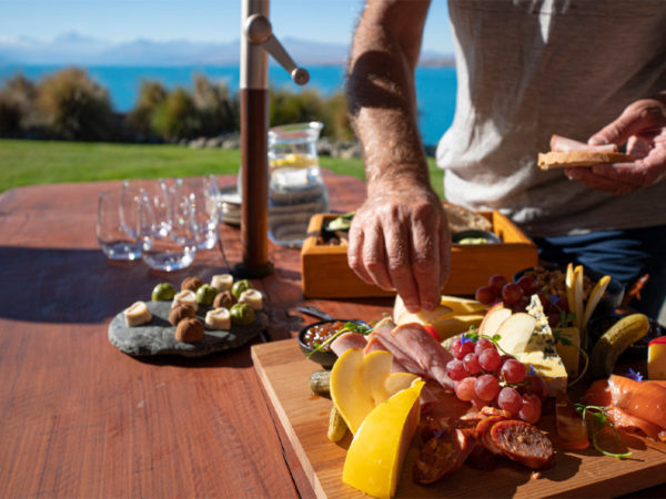 Luxury Trail Company Premier experience relaxing at Lakestone Lodge with gourmet platter